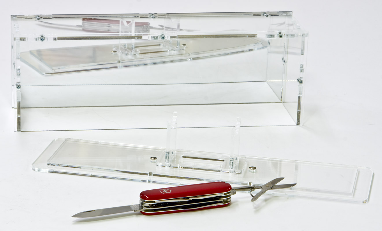 The Base and Knife Stand outside of the Knife Case